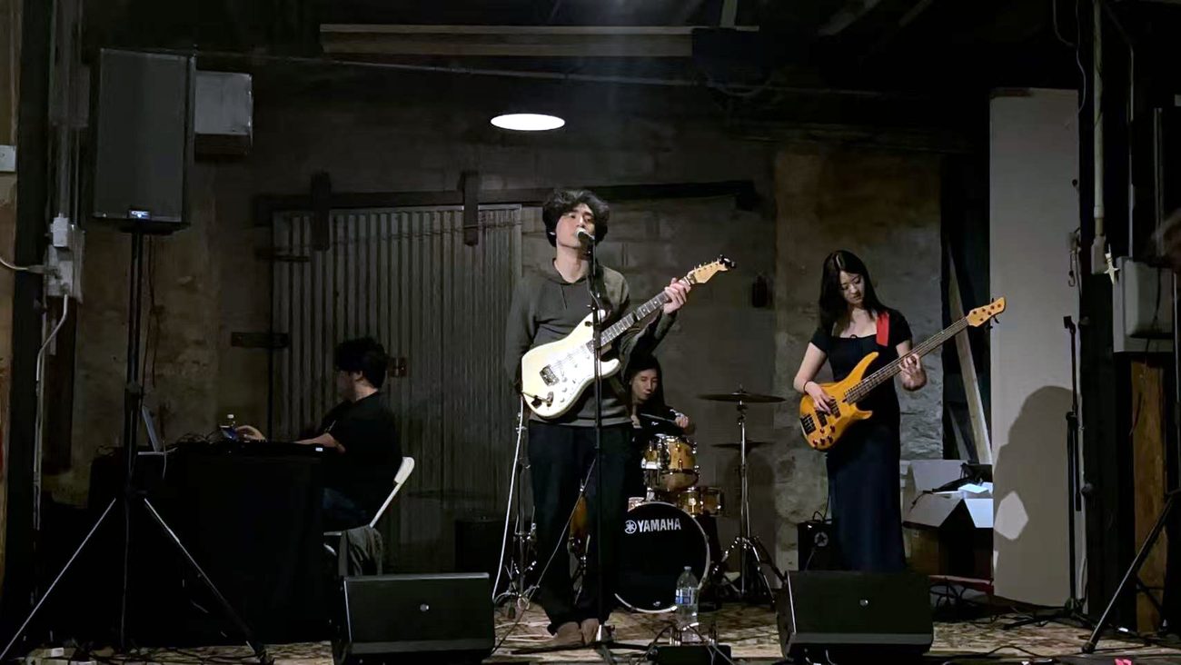 Mang Rope, full ensemble, live in an industrial space