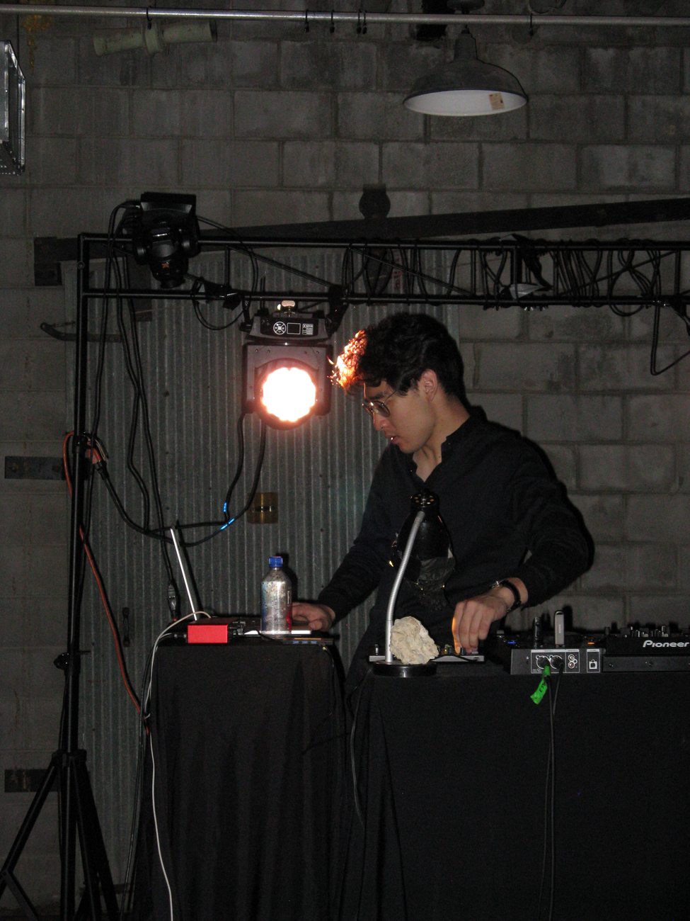 A First Flush gathering, participants at rest in a converted industrial space
